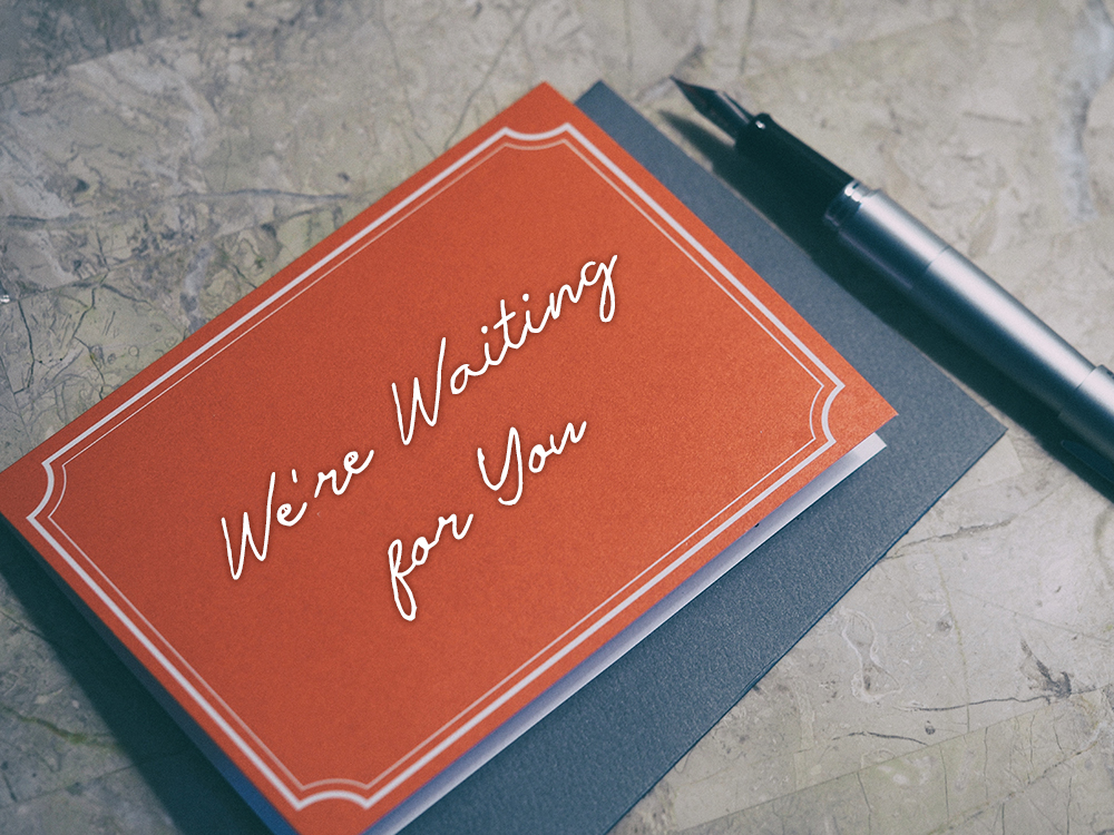 Photo of a card saying "We're waiting for you".